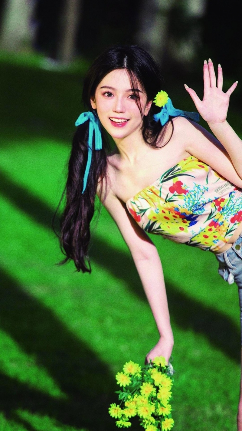 双马尾辫少女肤白貌美户外写真  第4张