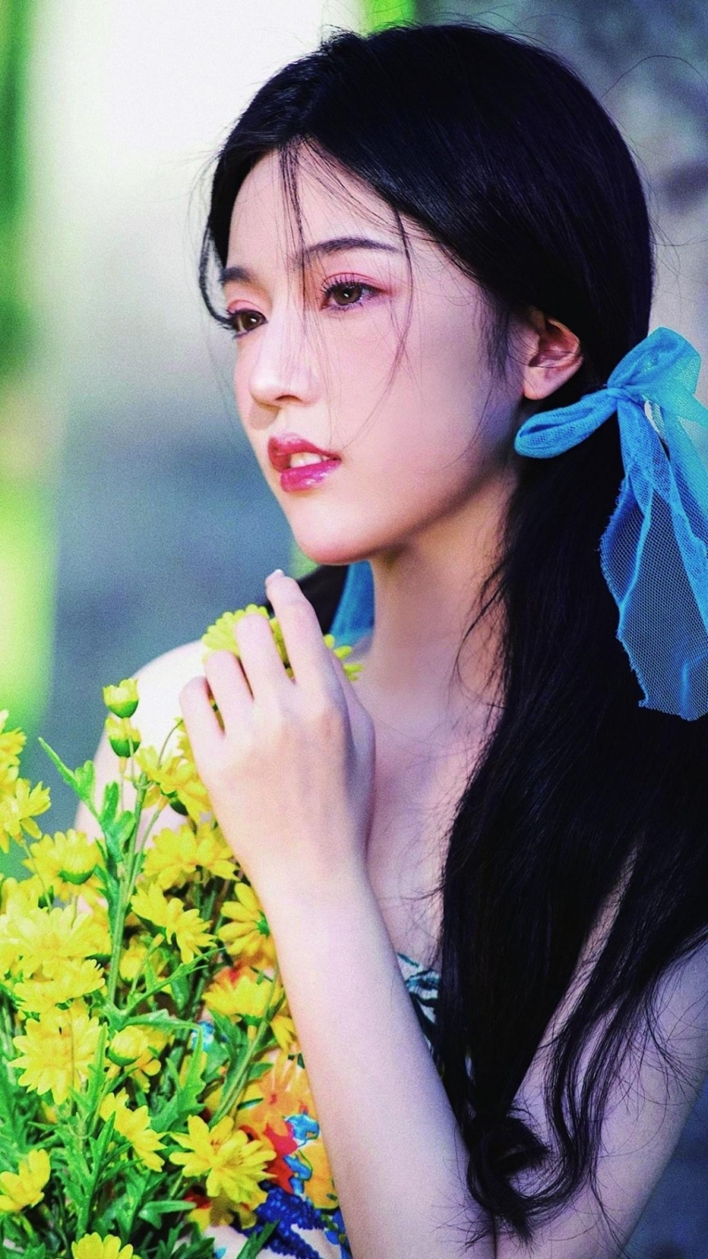 双马尾辫少女肤白貌美户外写真  第5张