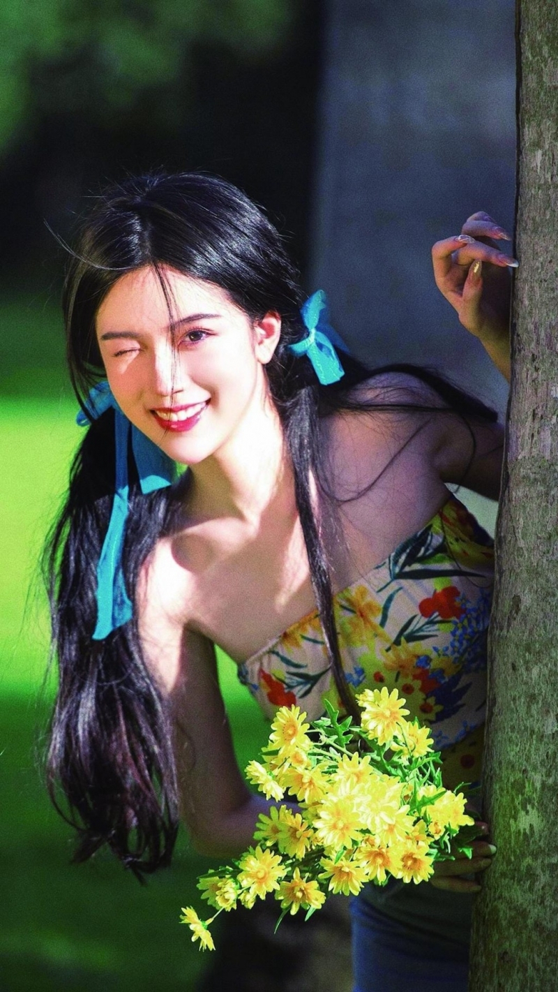 双马尾辫少女肤白貌美户外写真  第6张