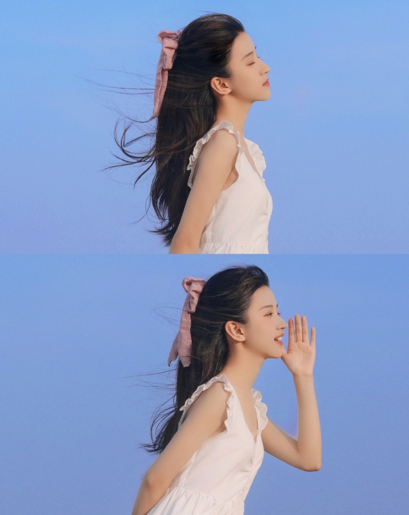 海边美女吊带白裙长发飘飘写真  第1张