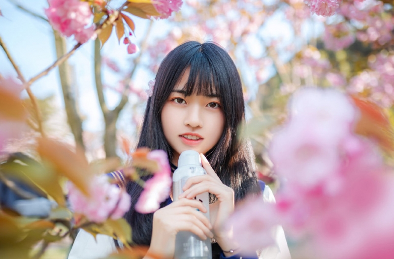 制服美女校花樱花树下唯美写真  第6张